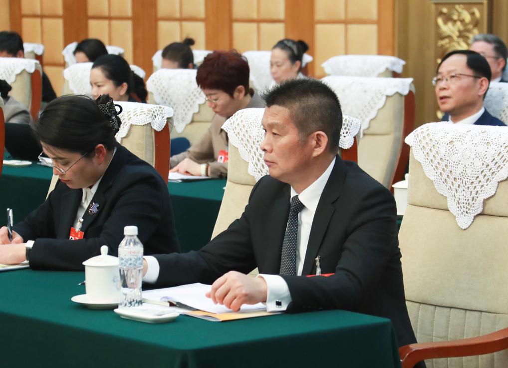 两会·影像链接丨他们从基层一线来到人民殿堂(图2)